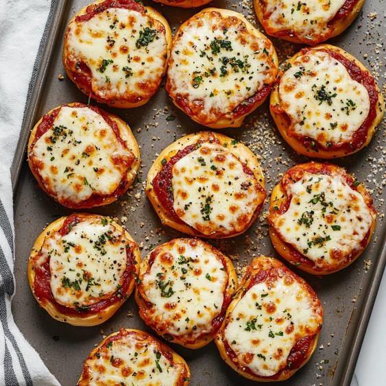 A tray of cheese and tomato pizza.