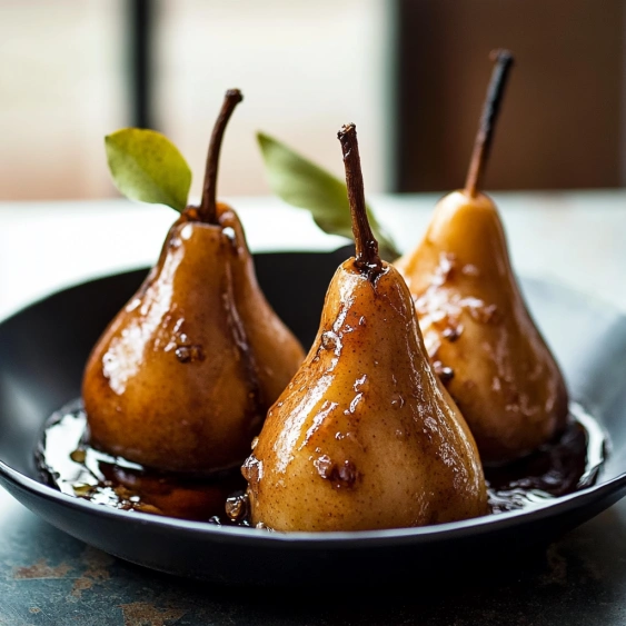 Three pears on a plate.